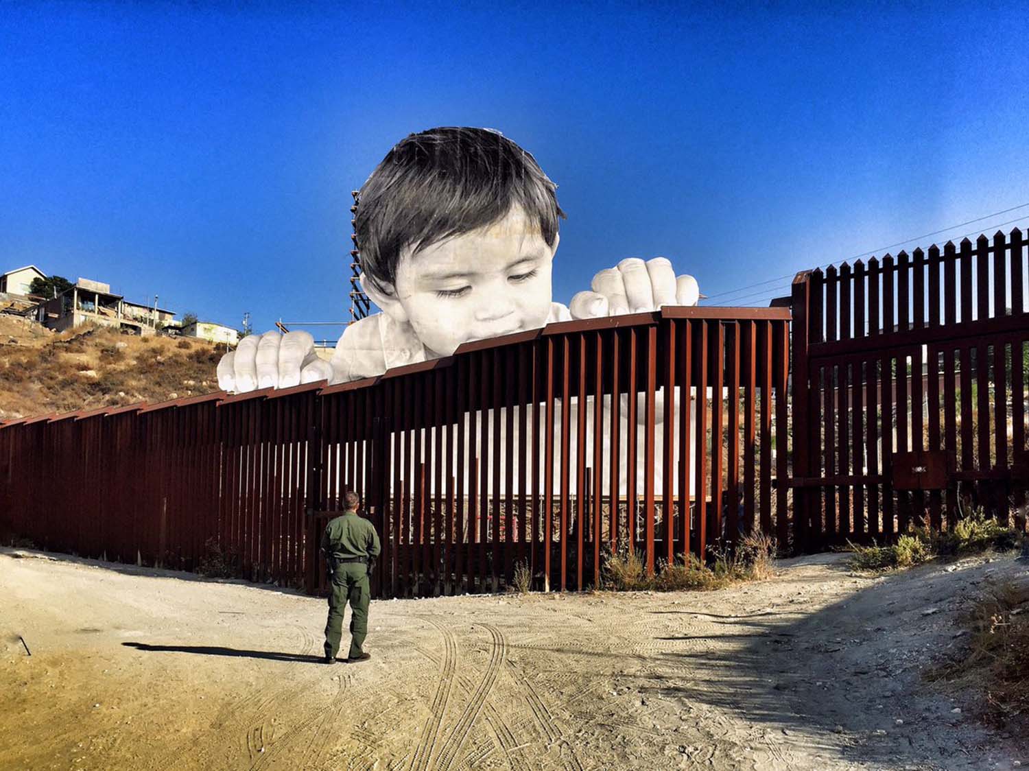 arte- contemporáneo-JR-artista frances-frontera-interevencion-niños-muro-Mexico-Estados Unidos
